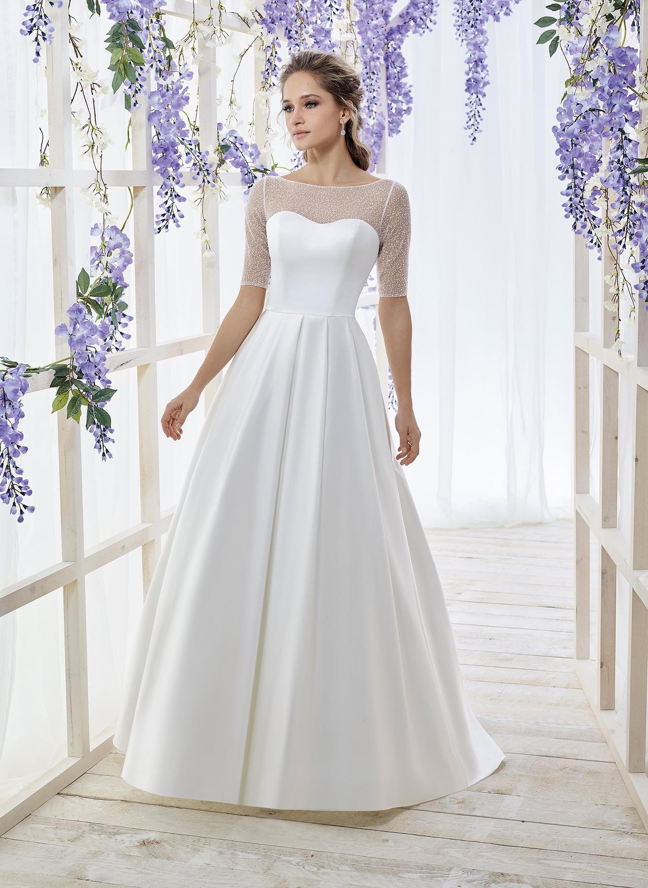 Vestidos de novia con mangas tres cuartos: 25 modelos únicos