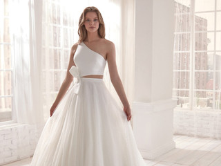 Vestidos de novia con escote asimétrico: 35 modelos para todos los estilos