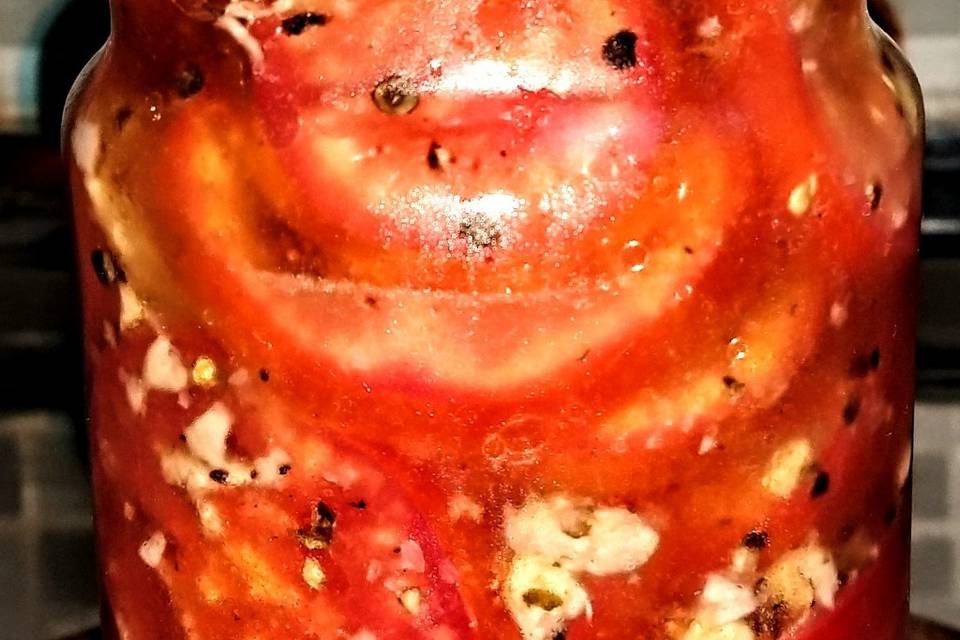 Tomates, en oliva, ajo